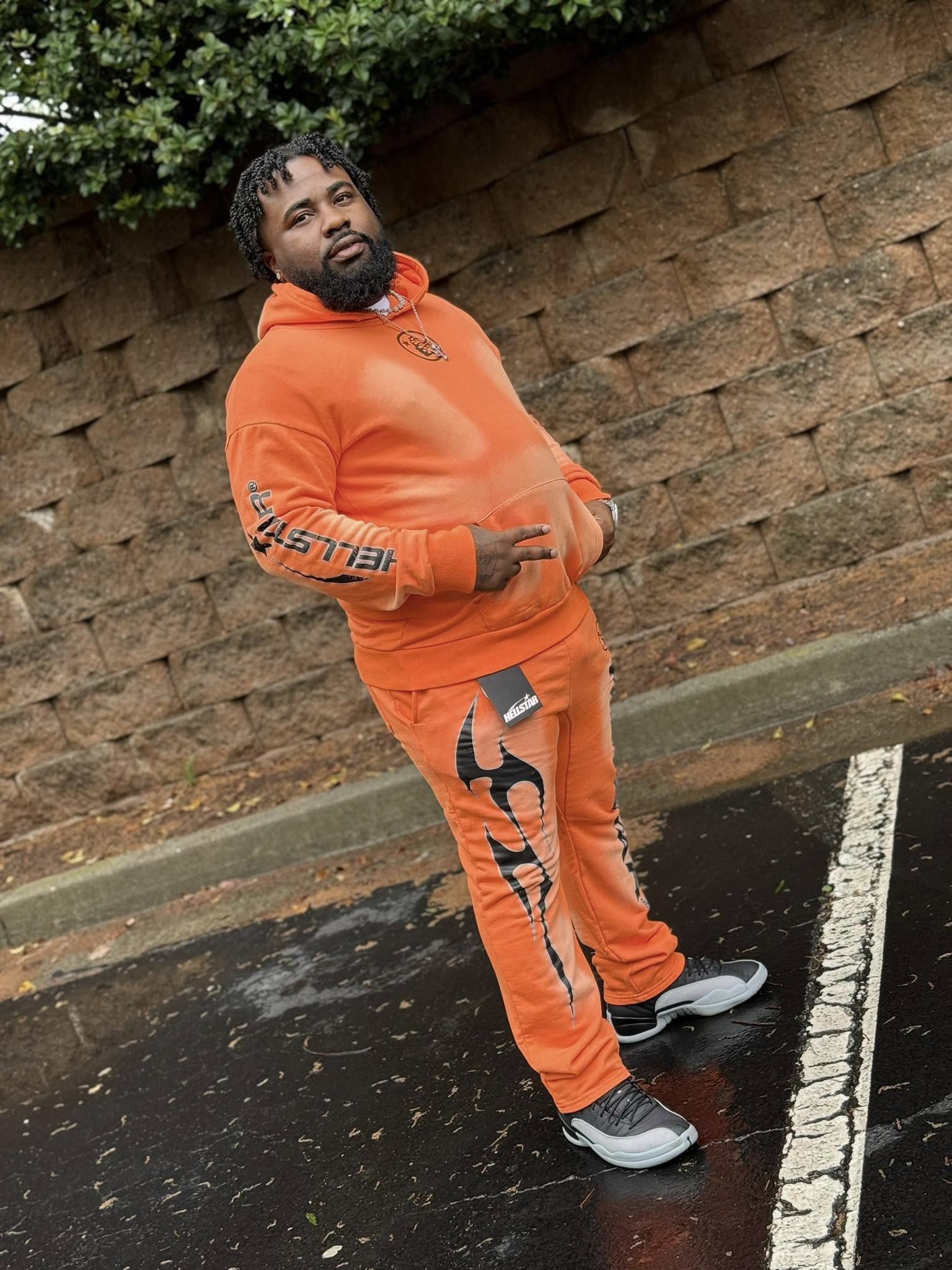 David Brown in an orange outfit